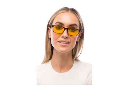 Woman Wearing Tortoise Shell Light Sensitivity Glasses